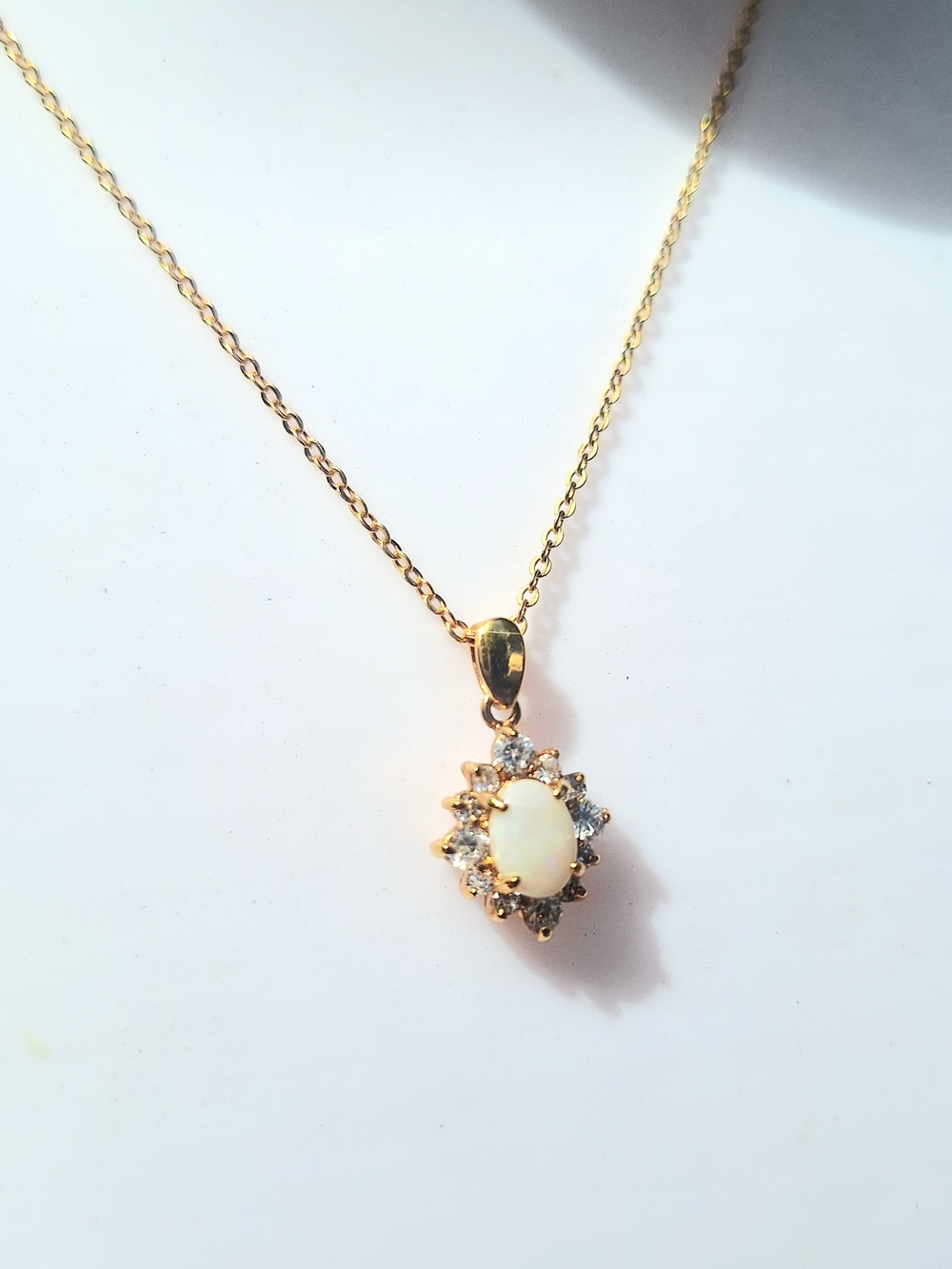 Gold-tone Opal Halo Pendant Necklace and matching Earrings
